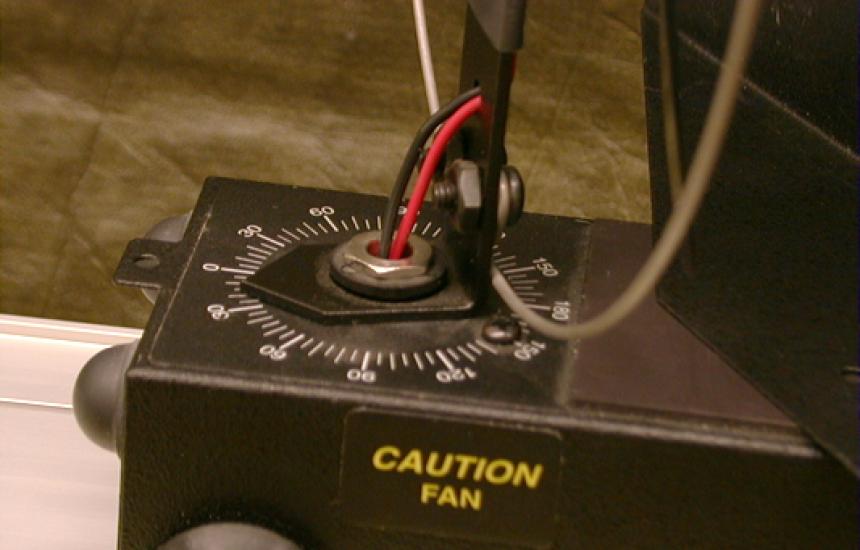 The fan can be rotated. Watch out for your fingers when you flip the switch.