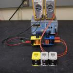 A step down transformer has 400 turns on the primary coil and 200 turns on the s